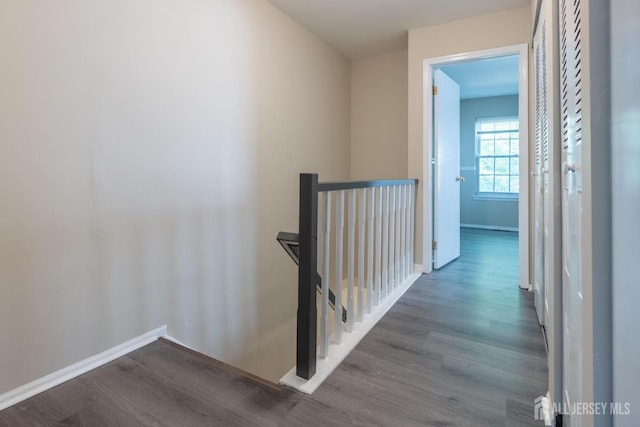 72 Morgan Pl E, Brunswick, NJ 08816 - hallway featuring an upstairs landing and dark wood-style flooring
