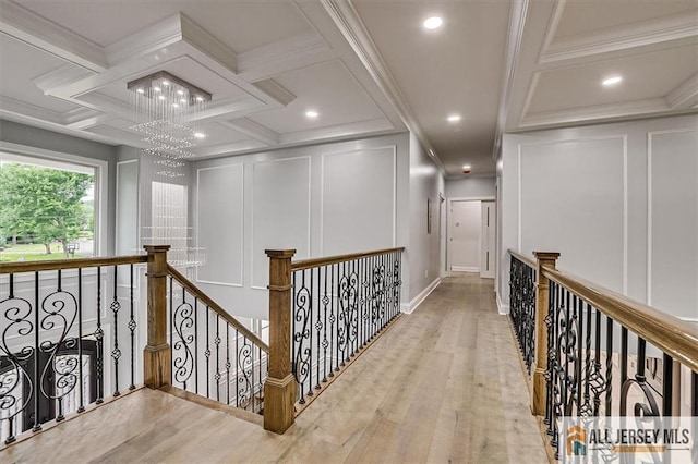 4 Hemlock Dr, Edison, NJ 08820 - corridor with a decorative wall, an upstairs landing, coffered ceiling, wood finished floors, and a chandelier