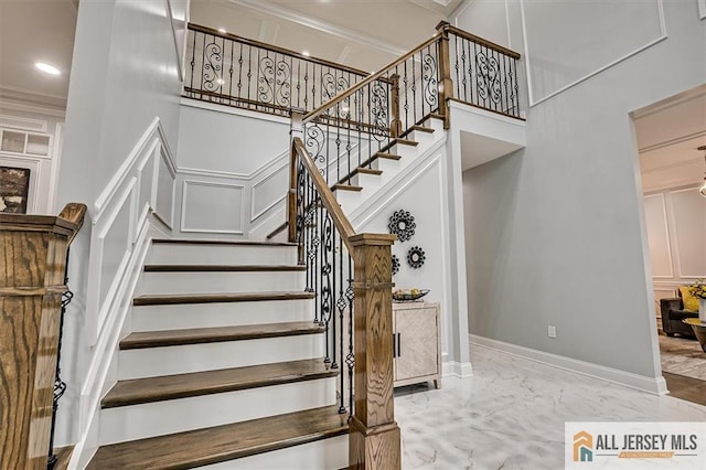 4 Hemlock Dr, Edison, NJ 08820 - staircase featuring marble tiled floors, ornamental molding, recessed lighting, a towering ceiling, and baseboards