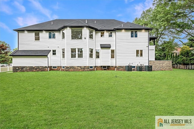 4 Hemlock Dr, Edison, NJ 08820 - rear view of property with a yard and cooling unit