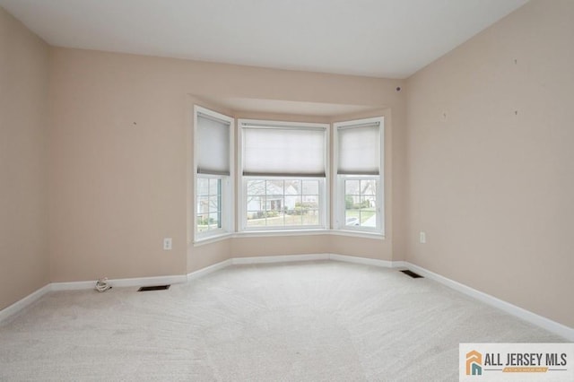 15 Dolley Madison Dr Unit 15C, Monroe, NJ 08831 - carpeted spare room with baseboards