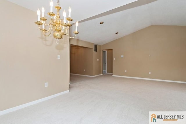 15 Dolley Madison Dr Unit 15C, Monroe, NJ 08831 - carpeted spare room with vaulted ceiling, a chandelier, and baseboards