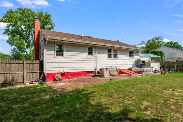 25 Lamar Ave, Edison, NJ 08820 - rear view of house with a chimney