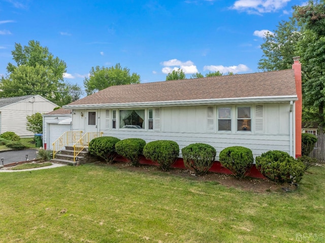 25 Lamar Ave, Edison, NJ 08820 - view of front of property with a front yard, a chimney, and roof with shingles