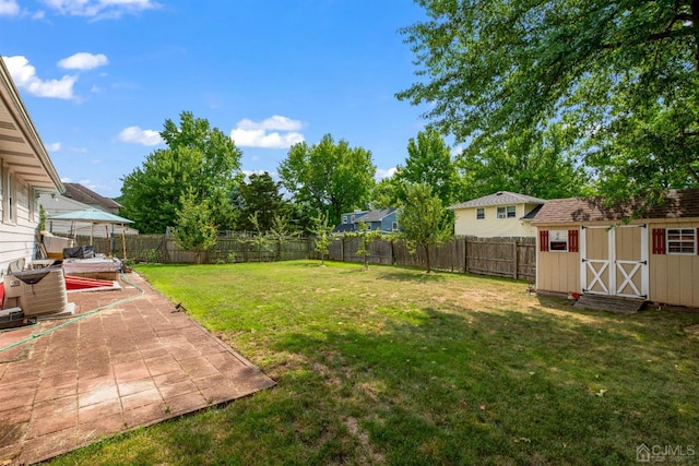 25 Lamar Ave, Edison, NJ 08820 - fenced backyard with a patio area and a storage shed