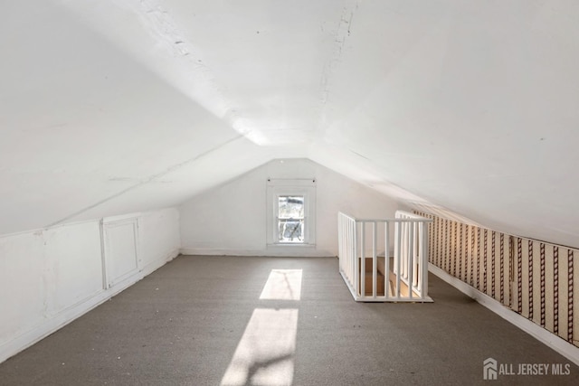 bonus room featuring vaulted ceiling