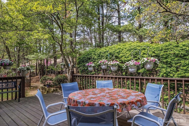 deck featuring outdoor dining space