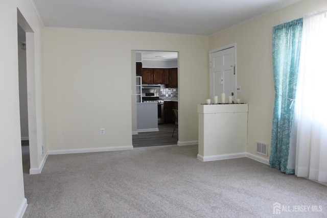 2 Haven Ter, Sayreville, NJ 08859 - unfurnished room with light colored carpet, ornamental molding, and baseboards