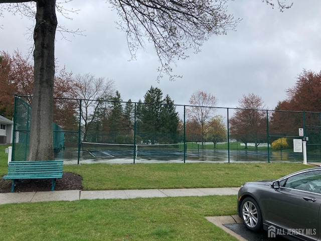 191 Wycoff Way W, East Brunswick, NJ 08816 - view of sport court with a yard and fence