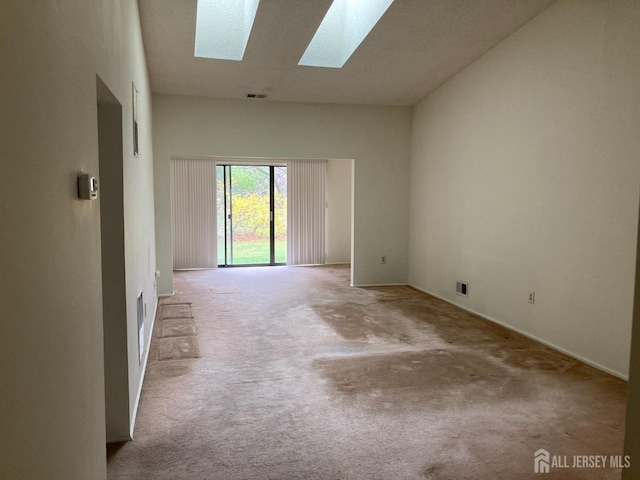 191 Wycoff Way W, East Brunswick, NJ 08816 - unfurnished room featuring a skylight, carpet floors, and visible vents