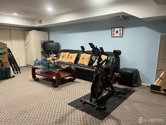 exercise room featuring carpet, visible vents, baseboards, and recessed lighting