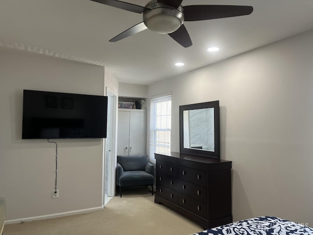 carpeted bedroom with baseboards, a ceiling fan, and recessed lighting