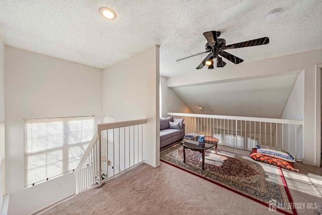 253 Nebula Rd, Piscataway, NJ 08854 - living area featuring ceiling fan, carpet flooring, vaulted ceiling, and a textured ceiling