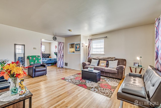 living room with wood finished floors