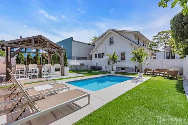 view of swimming pool featuring a patio area and a gazebo