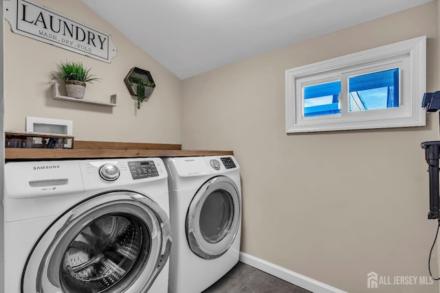 1307 Camp Ave, Ocean, NJ 07712 - washroom featuring washing machine and clothes dryer, baseboards, and dark tile patterned floors
