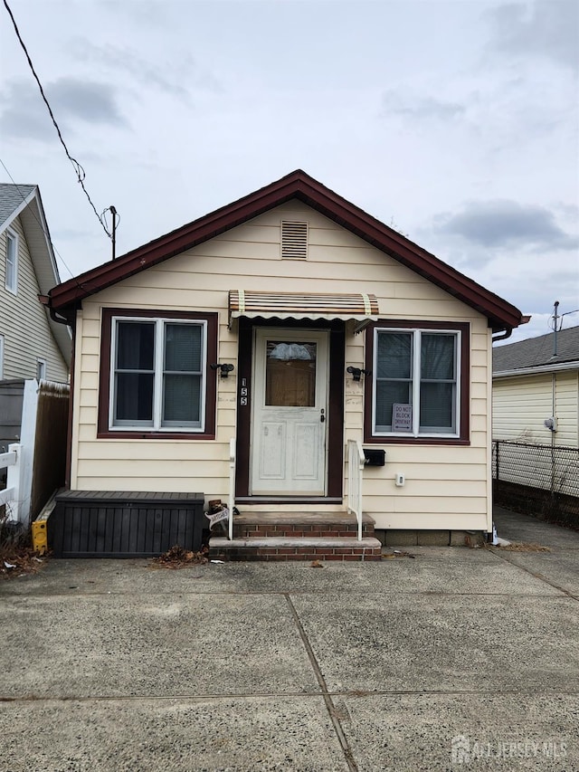 view of front of property with fence