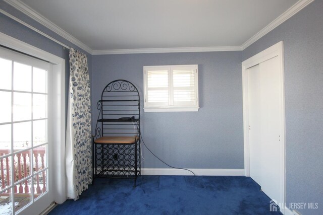 unfurnished bedroom featuring dark carpet and ornamental molding