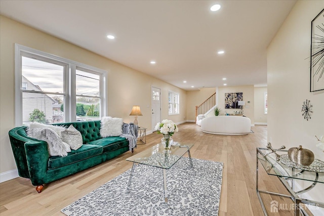 24 Savoy St, Colonia, NJ 07067 - living room with stairway, light wood finished floors, recessed lighting, and baseboards
