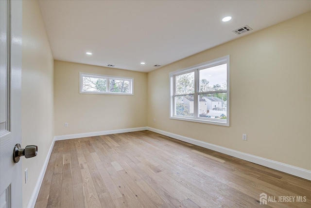 24 Savoy St, Colonia, NJ 07067 - empty room with light wood finished floors, baseboards, and recessed lighting