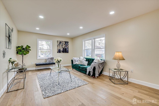 24 Savoy St, Colonia, NJ 07067 - living area with wood finished floors, baseboards, and recessed lighting