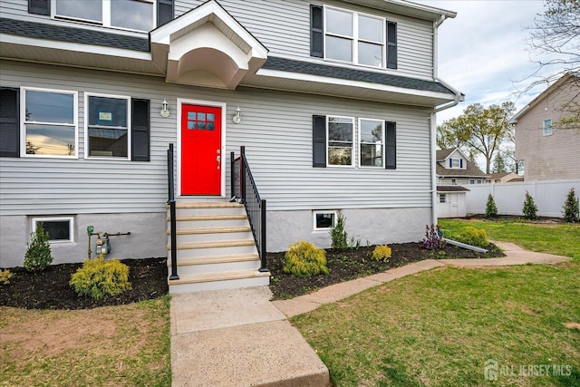 24 Savoy St, Colonia, NJ 07067 - view of front of home with roof with shingles