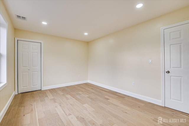 24 Savoy St, Colonia, NJ 07067 - spare room with light wood-style floors, baseboards, and recessed lighting