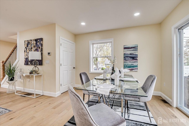 24 Savoy St, Colonia, NJ 07067 - dining room with light wood finished floors, baseboards, recessed lighting, and stairs