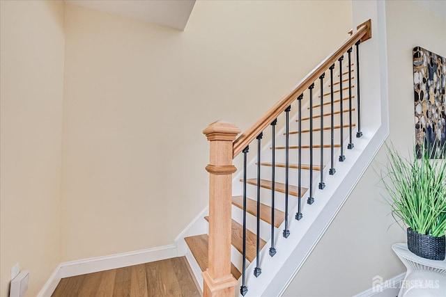 24 Savoy St, Colonia, NJ 07067 - stairs with wood finished floors and baseboards