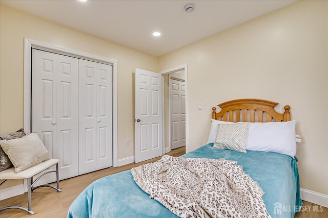 24 Savoy St, Colonia, NJ 07067 - bedroom with wood finished floors, a closet, recessed lighting, and baseboards