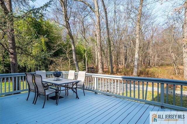 27 Revere Ct, West Windsor, NJ 08550 - wooden terrace featuring outdoor dining area
