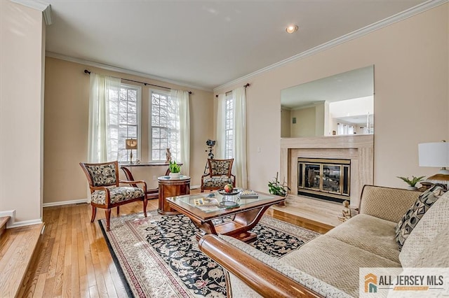 27 Revere Ct, West Windsor, NJ 08550 - living room with baseboards, hardwood / wood-style flooring, crown molding, a fireplace, and recessed lighting