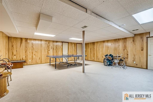 27 Revere Ct, West Windsor, NJ 08550 - rec room with wooden walls, carpet, and a drop ceiling