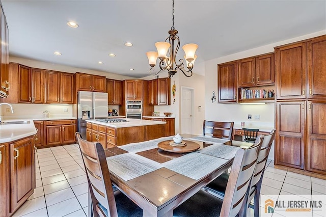 27 Revere Ct, West Windsor, NJ 08550 - dining space with light tile patterned floors, a chandelier, and recessed lighting