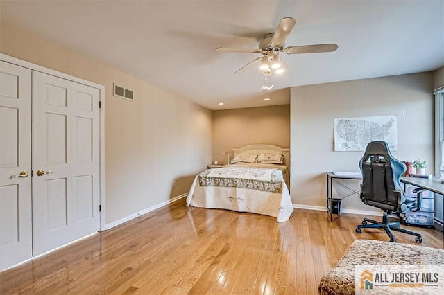 27 Revere Ct, West Windsor, NJ 08550 - bedroom with light wood-style flooring, baseboards, and ceiling fan