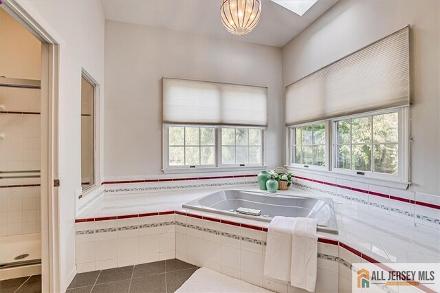 27 Revere Ct, West Windsor, NJ 08550 - full bathroom with tile patterned floors, a garden tub, and tiled shower