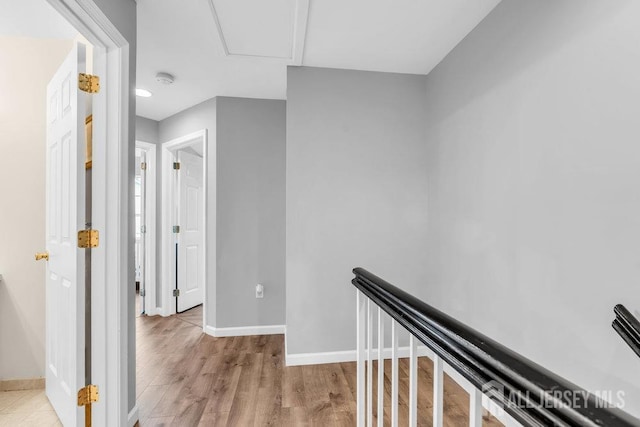 3 Kuczynski Dr, Sayreville, NJ 08859 - hall with light wood-style flooring and an upstairs landing