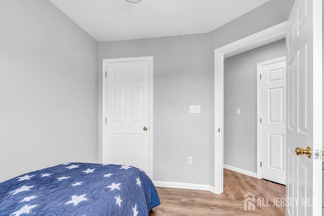 3 Kuczynski Dr, Sayreville, NJ 08859 - bedroom with wood finished floors and baseboards