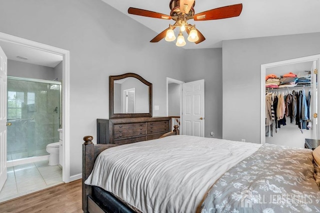 3 Kuczynski Dr, Sayreville, NJ 08859 - bedroom with wood finished floors, vaulted ceiling, a spacious closet, connected bathroom, and ceiling fan