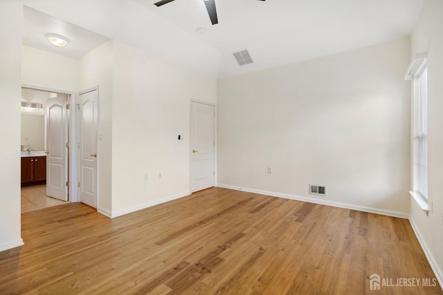 unfurnished bedroom with light hardwood / wood-style flooring and ceiling fan