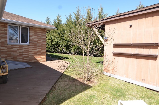 view of yard featuring a wooden deck