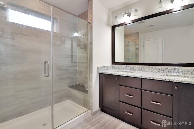 9 Clover Ln, Monroe, NJ 08831 - bathroom featuring double vanity and a stall shower