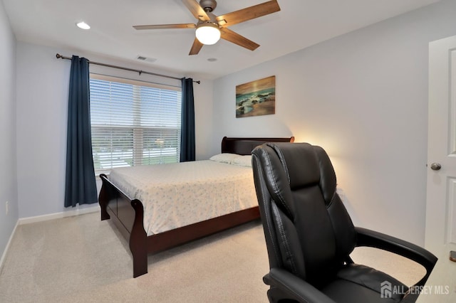 bedroom featuring baseboards, light carpet, a ceiling fan, and recessed lighting