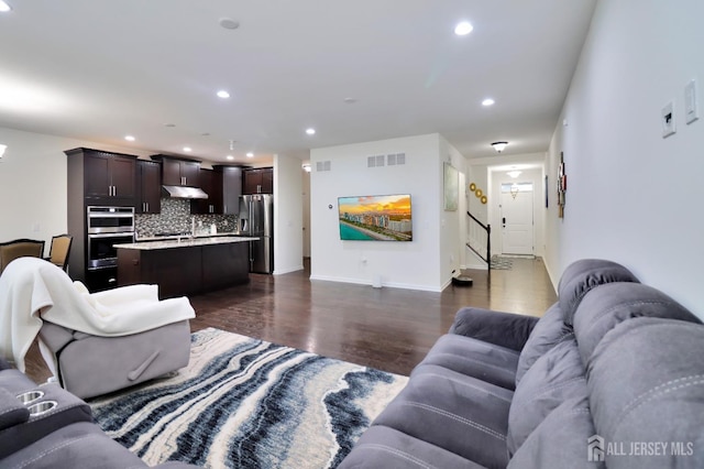 9 Clover Ln, Monroe, NJ 08831 - living room featuring dark wood-style floors, recessed lighting, and baseboards