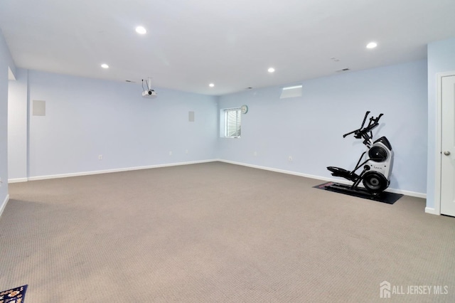 workout room featuring carpet floors, baseboards, and recessed lighting
