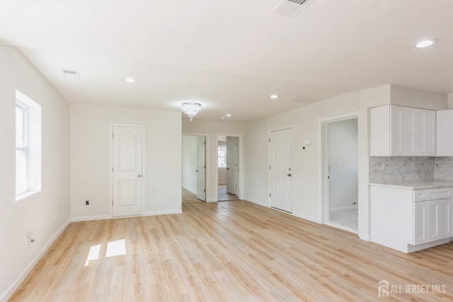 17-1/2 Thomas St, South River, NJ 08882 - unfurnished living room featuring light wood-type flooring and recessed lighting