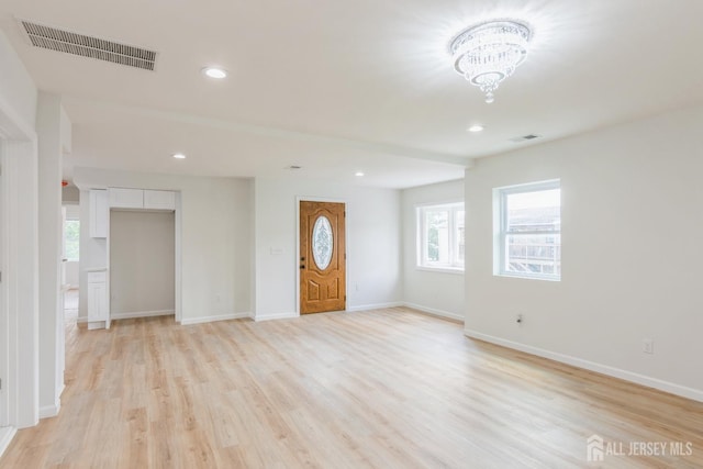 17-1/2 Thomas St, South River, NJ 08882 - foyer entrance featuring light wood-style floors, a chandelier, and recessed lighting