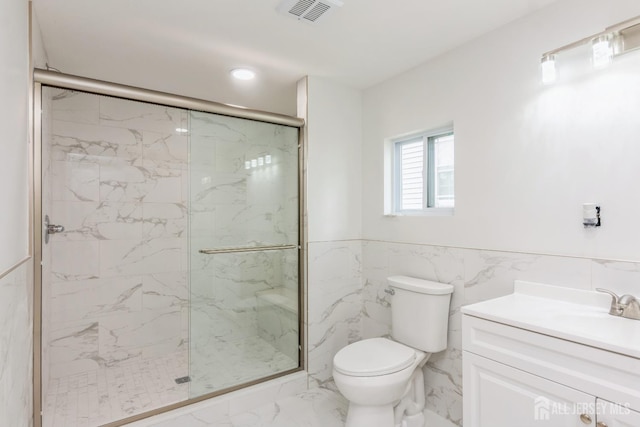 17-1/2 Thomas St, South River, NJ 08882 - full bathroom featuring marble finish flooring, a marble finish shower, vanity, wainscoting, and tile walls