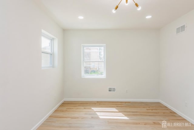 17-1/2 Thomas St, South River, NJ 08882 - empty room with plenty of natural light, light wood-type flooring, and recessed lighting