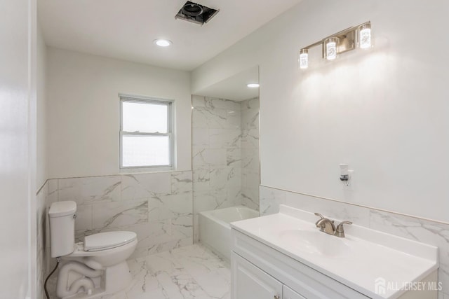 17-1/2 Thomas St, South River, NJ 08882 - bathroom featuring vanity, marble finish floors, tile walls, a wainscoted wall, and recessed lighting